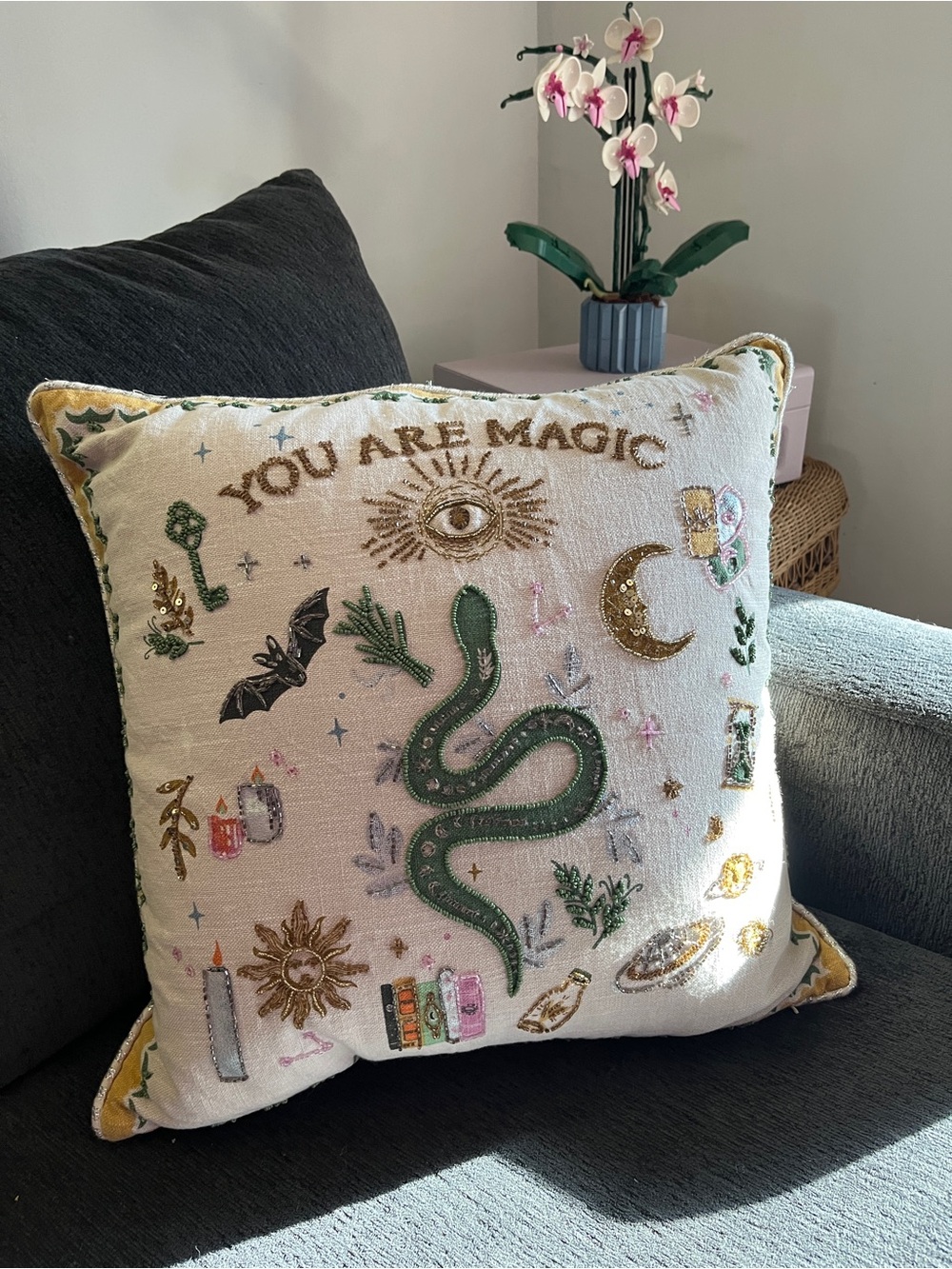 Whimsical and celestial embroidered decorative pillow